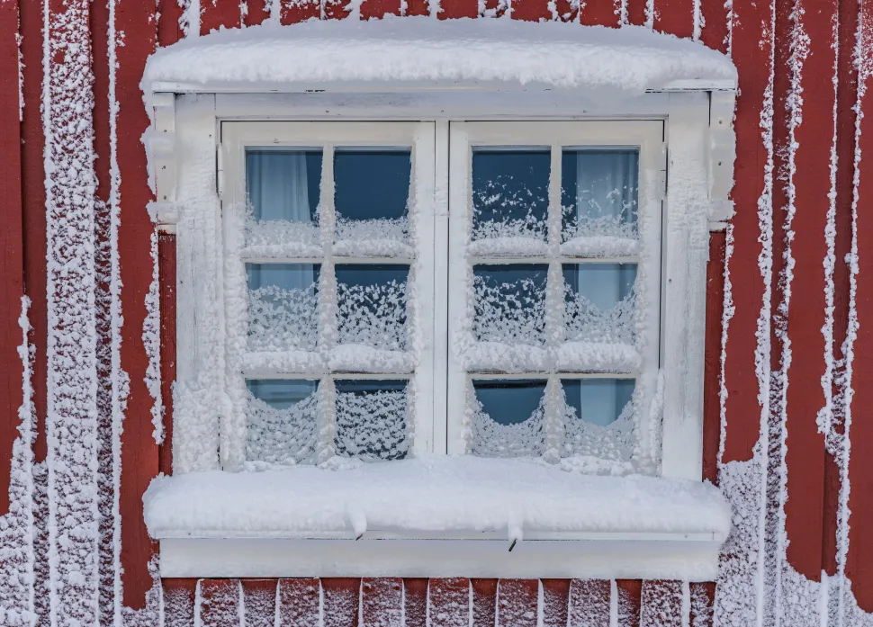 A window covered in snow